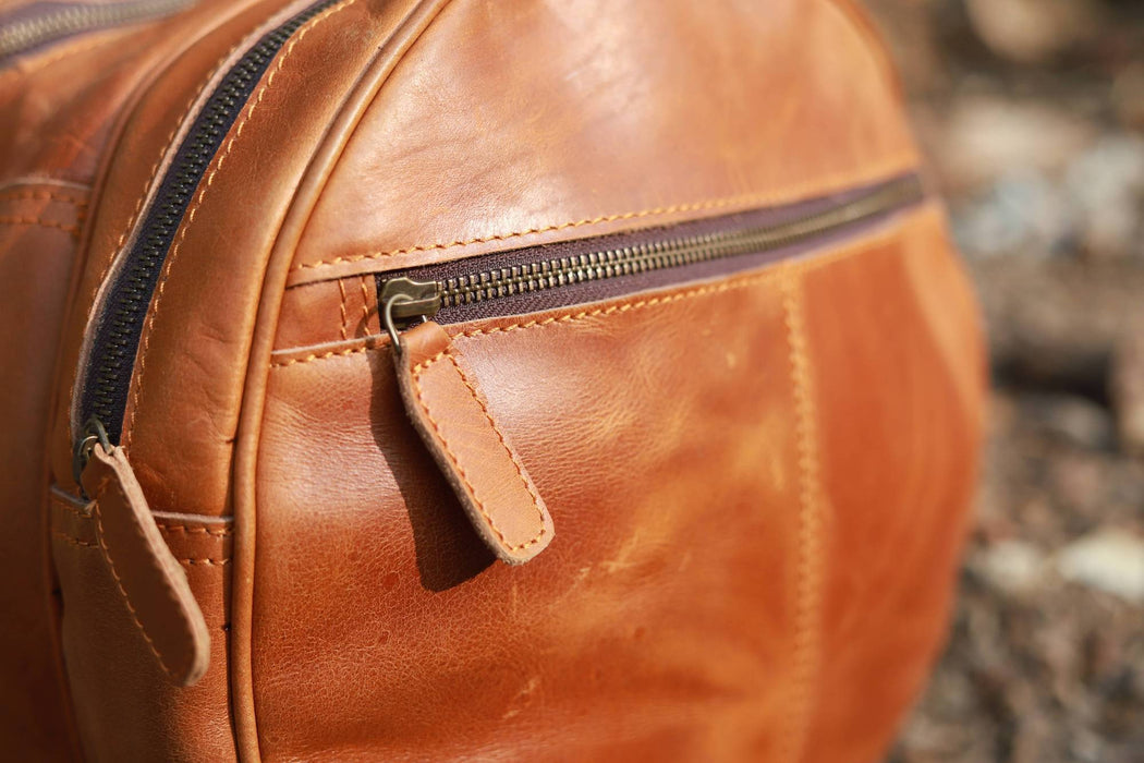 tan leather travel holdall