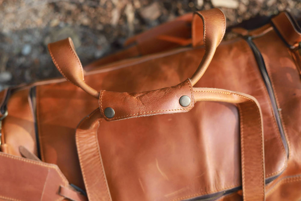 large tan leather holdall bag