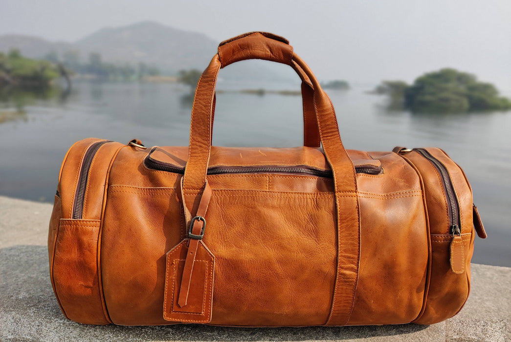 tan distressed leather holdall