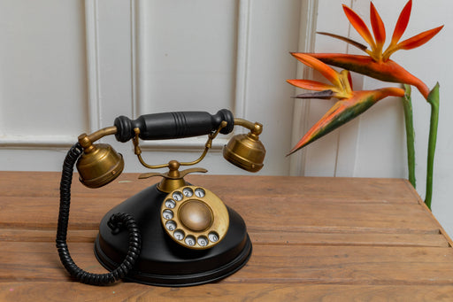 black rotary desk phone