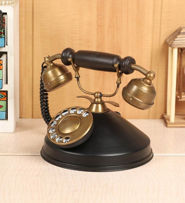 black rotary dial desk phone