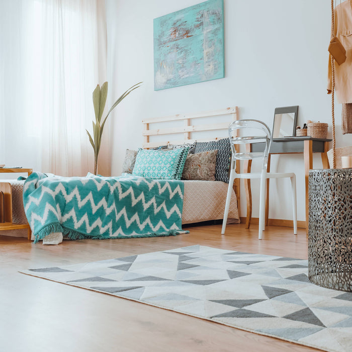 10 Tips for Decorating Hardwood Floors with Rugs - The Handmade Store