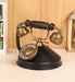 black rotary dial desk phone 